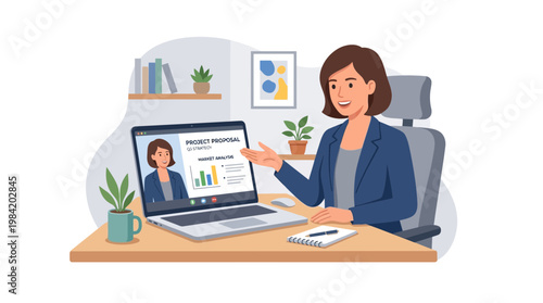 A woman in a blue blazer sits at a desk with a laptop and explains a graph to someone in a meeting room with plants.