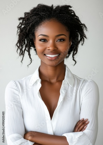 Confident Black Woman Smiling in White Shirt - Portrait