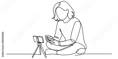 A continuous line drawing of a person sitting and filming themselves with a phone on a tripod. Vector, illustration