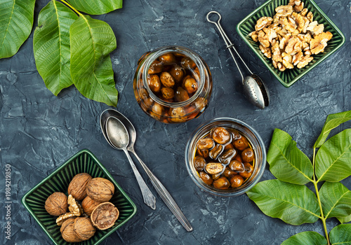 Assorted Nuts with Oil on Plate, Hazelnuts and Pecans Still Life