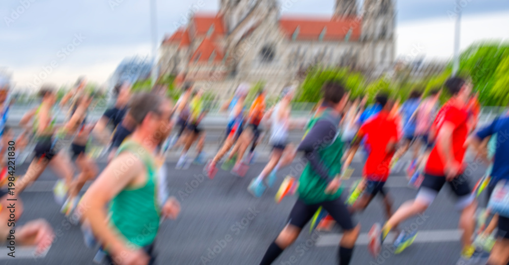 Obraz premium marathon runners in the city, motion blur