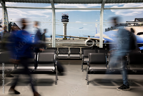 Walking rapidly, blurred motion and crowd in busy airport lounge. Navigating chaotic environment, long flight layover and group of passengers in transit hub before departure