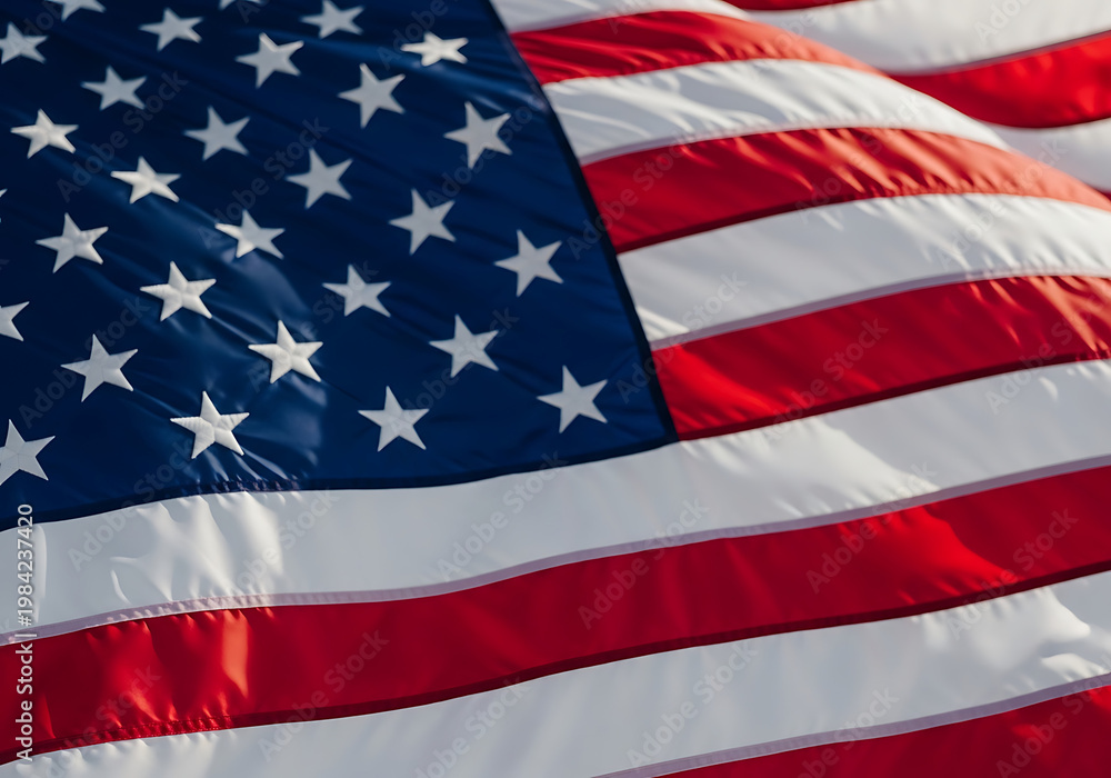 Fototapeta premium Close up of the american flag stars and stripes waving with patriotic pride