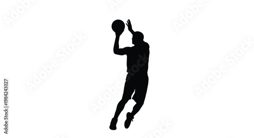 Silhouette of a basketball player in the act of shooting a jump shot