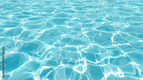 Fotografía Crystal clear blue swimming pool water surface texture with bright sun light reflections