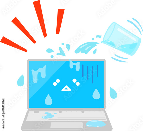 グラスの水がかかったノートパソコン