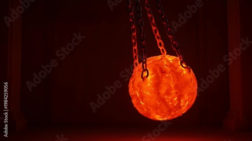 Glowing molten metal ball suspended chains in dark atmosphere
