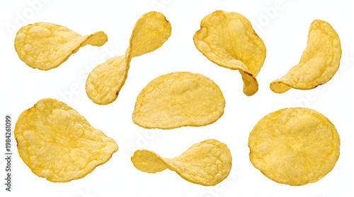 A delicious serving of crispy potato chips scattered on a clean white background