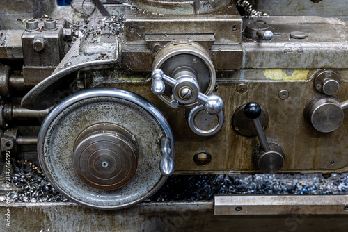 Vintage industrial metalworking lathe machine with shavings
