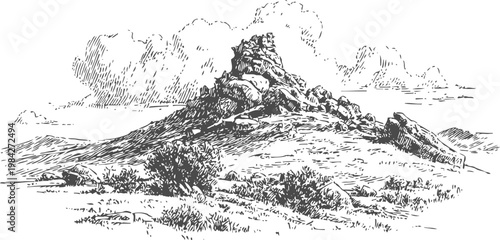 rocky hill landscape with scattered bushes and rough terrain under cloudy sky