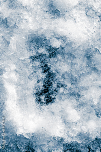 Ice crush on a white background. Chill backdrop. Frame border, made of ice