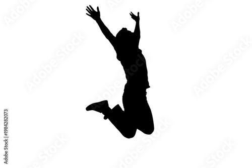 Joyful Leap: A silhouetted figure leaps into the air, arms raised in a gesture of pure joy and boundless freedom against a plain backdrop.