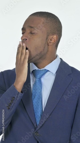 Yawning African Businessman on White Background, Vertical Video