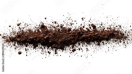Fine, textured brown powder trail against a stark black backdrop, with speckled edges