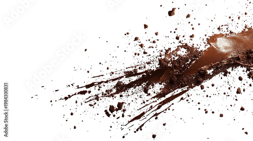 Fluid brown splash with small particulate matter against a stark black background