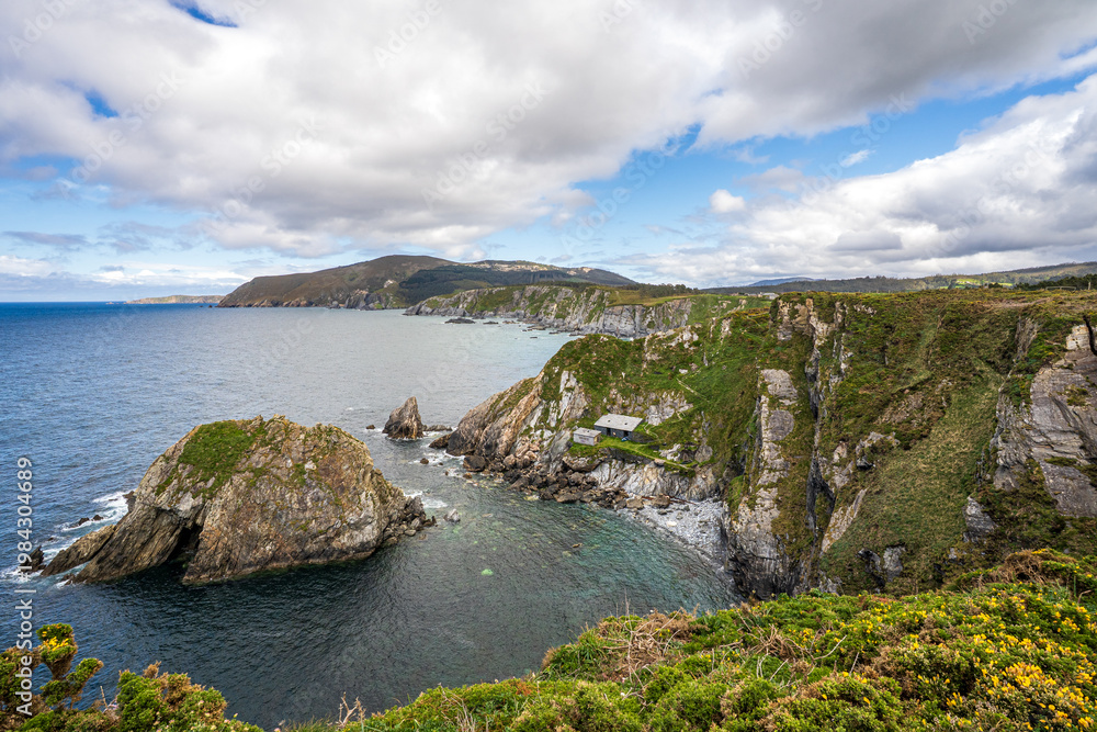 Fototapeta premium Coastal landscape with Loiba cliffs and old fisherman's hut, Galicia, Spain.
