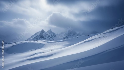 Snow-covered mountain landscape under cloudy sky in winter  
