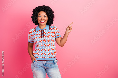 Quadro em tela Happy young woman curly hair wear geometric patterned shirt and jeans points rig