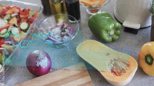 Camera panning onion and halved squash on board static overlay graphs sweeping showing nutrition
