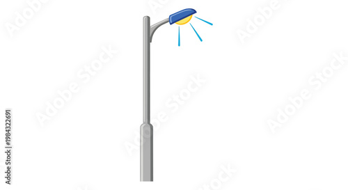 Street lamp with yellow light illuminating street at night.