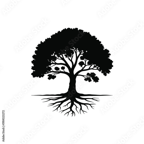 A black silhouette of a tree with roots and branches