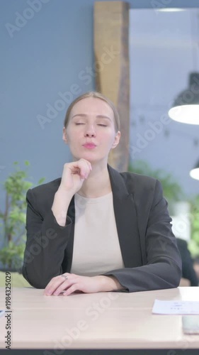 Wallpaper Mural Pensive Businesswoman Thinking while Sitting at Work, Vertical Video Torontodigital.ca