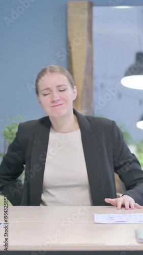 Wallpaper Mural Businesswoman with Spinal Back Pain in Office, Vertical Video Torontodigital.ca