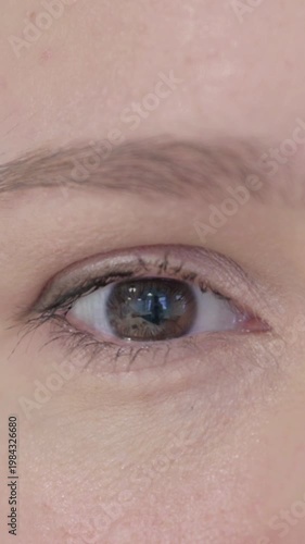 Wallpaper Mural Close Up of Female Eyes Looking at Camera, Vertical Video Torontodigital.ca