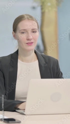 Wallpaper Mural Businesswoman Shaking Head in Rejection while Working on Laptop, Vertical Video Torontodigital.ca