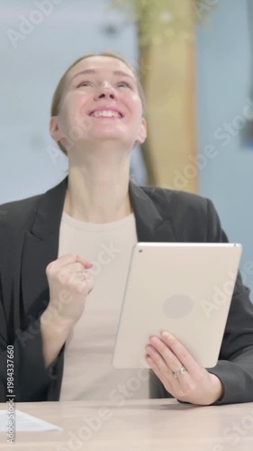 Wallpaper Mural Businesswoman Cheering Win on Digital Tablet, Vertical Video Torontodigital.ca