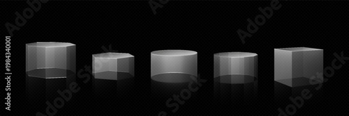 A set of transparent glass podiums or pedestals of various geometric shapes.