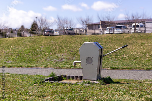 Manual water pump in a public park in Japan.