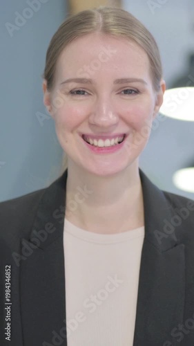 Wallpaper Mural Portrait of Businesswoman Smiling at Camera, Vertical Video Torontodigital.ca