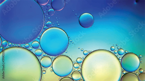 A macro photograph of oil and water droplets in a colorful liquid mixture