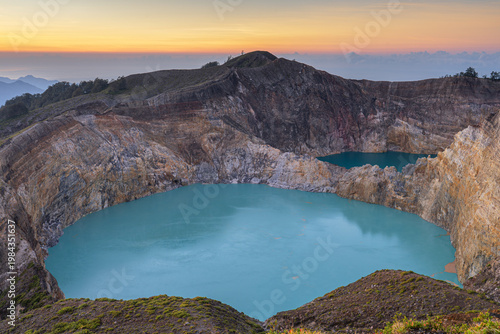 Photos Majestic Sunrise View of the Two Turquoise Volcanic Crater Lakes of Mount Kelimu