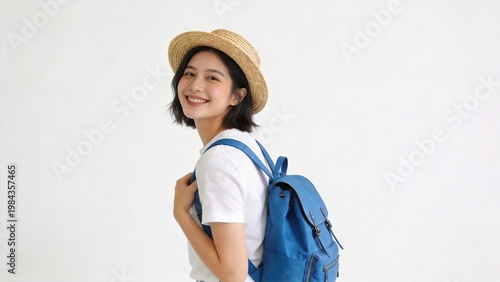 Smiling woman with backpack and hat