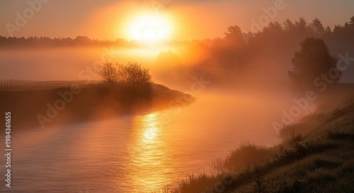 A serene landscape of a misty river at sunrise with trees and grassy banks