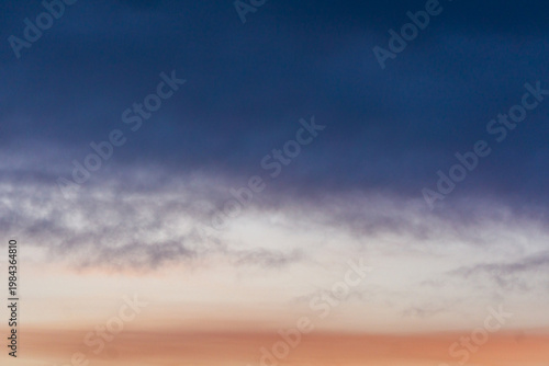 Gradient sky with soft clouds at sunset