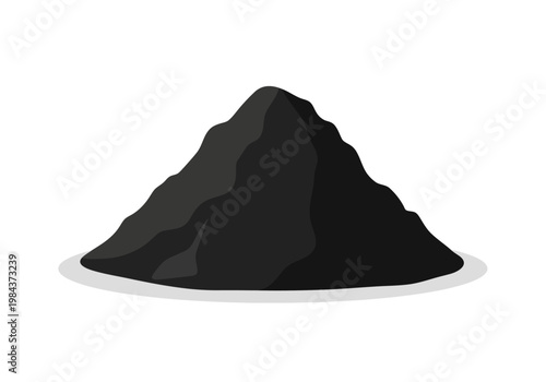 A large pile of dark material sits on a flat surface indoors.