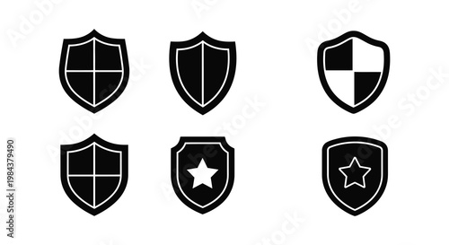 Collection of six black shield emblems presented as a striking silhouette