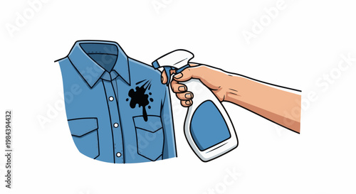 Hand spraying stain remover on a blue shirt