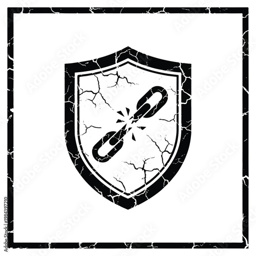 Cracked shield with broken chain link.