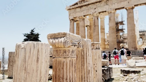 Ancient parthenon ruins with crowd visiting acropolis in athens