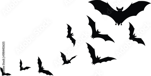 A swarm of bats in flight a halloween silhouette scene