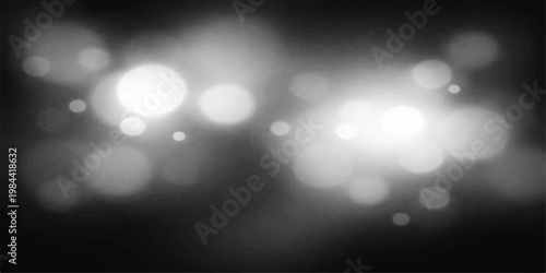 Abstract blue glowing bokeh lights background with blurred holiday shine