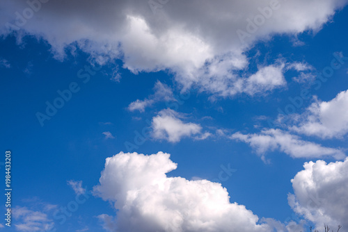 Blue sky with soft white clouds for abstract background