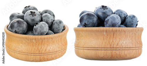 Fresh blueberries in wooden bowl isolated on white background, healthy organic berries close up