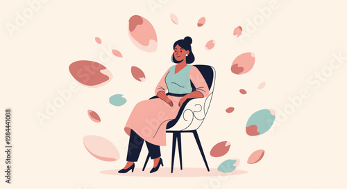 Woman sitting in a chair surrounded by colorful leaves.