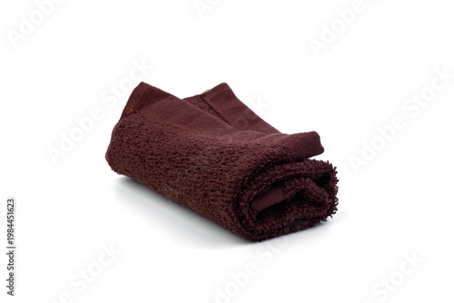 Small brown kitchen towel isolated on white background.