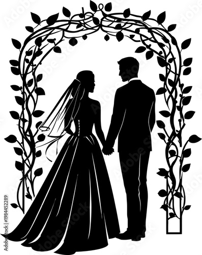 Bride and groom silhouette under leafy wedding arch